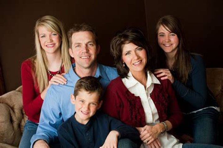 Kristi Noem and her son Booker on the family ranch... Kristi Noem, a