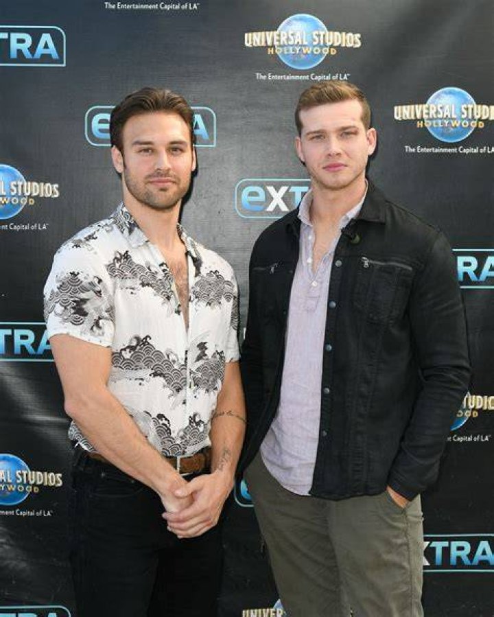Oliver Stark and Ryan Guzman at the Extra Universal Studios Hollywood