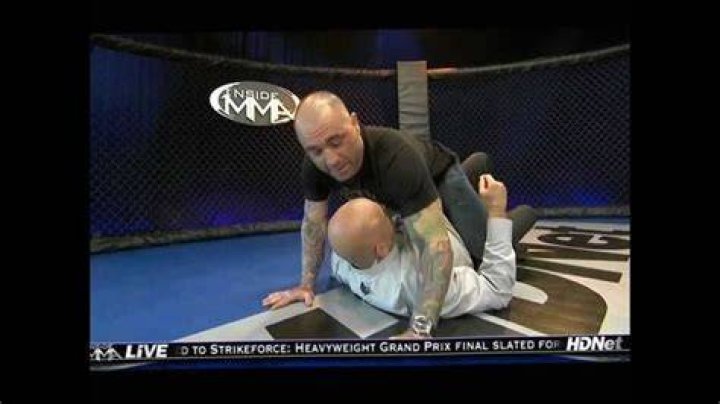 Rogan demonstrating taking the back with Bas Rutten Jiu jitsu