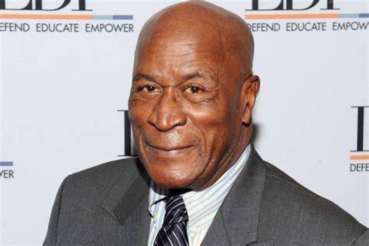 Who is his John Amos wife Noel J. Mickelson?