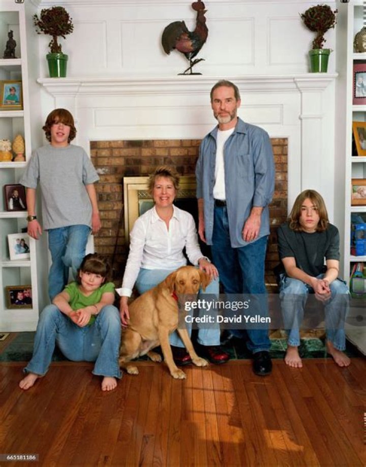 Writer John Grogan at home with his family and their dog Gracie. News